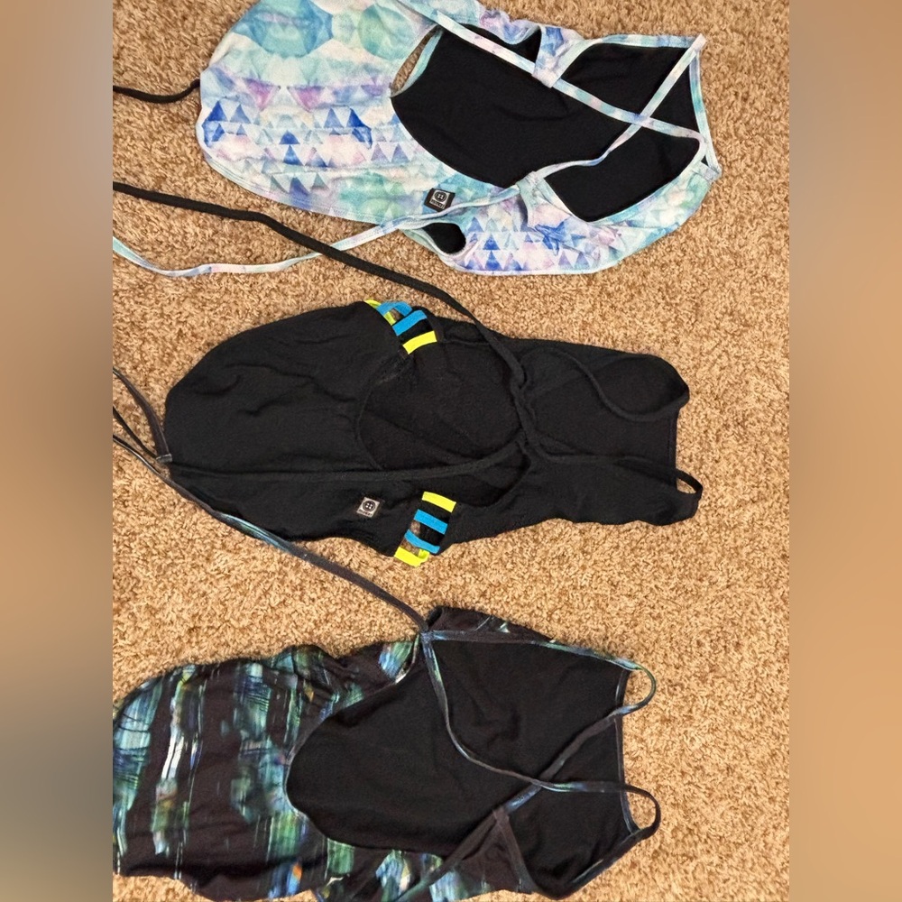 LOT OF JOLYN SWIMSUITS. 3 tie back performance suits